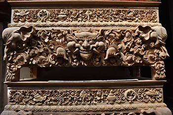 Tibetan wood carving: devotion art on wood