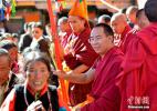 Oct. 18, 2016 -- The 11th Panchen Lama Bainqen Erdini Qoigyijabu gives blessings to religious believers. On September 10, the 11th Panchen Lama Bainqen Erdini Qoigyijabu visited the Gandanrebujie Monastery in Shigatse of China’s Tibet Autonomous Region. (Photo by Li Lin)
