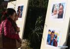 Nov. 14, 2016 -- People visit a photo exhibition showcasing natural and cultural beauty of southwest China`s city of Lhasa in Kathmandu, Nepal, Nov. 11, 2016. Organized by the China Cultural Center in Nepal, the photo exhibition entitled `Charming Lhasa` has been held here on Friday with more than 30 photos on display. (Xinhua/Sunil Sharma)