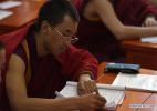 Nov. 18, 2016 -- A monk takes notes during a lesson at Qinghai Tibetan Buddhism College in Guide County, northwest China`s Qinghai Province, Nov. 16, 2016. The first batch of 120 monks have started their four-year full-time study at the newly-opened Tibetan Buddhism college recently. (Xinhua/Zhang Hongxiang)