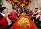 Nov. 18, 2016 -- Tourists enjoy snacks at a family inn owned by villager Degyi in Lhasa, capital of southwest China`s Tibet Autonomous Region, Nov. 15, 2016. The local government has strived to develop family inns in Lhasa in recent years as Tibet tourism gains popularity. Some 600 certified family inns featuring Tibetan culture will open for business in the next five years. (Xinhua/Liu Dongjun)