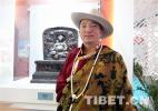 Nov. 21, 2016 -- Karma Gyaltse is a Level-3 Sculptor in Tibet. Here, he’s photographed with his work, The Black Jambhala Buddha.