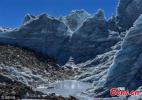 Nov. 22, 2016 -- Photo taken on November 21, 2016 shows the glaciers on a mountain in Nagarze county of Southwest China`s Tibet autonomous region. Since the glaciers stand near China`s No 40 boundary marker with the Kingdom of Bhutan, they are also called “40 glaciers.” (Photo/CFP)