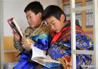 Nov. 28, 2016 -- Pupils read books in their dormitory at Daiqian school in Zhuaxixiulong Township of Tianzhu Tibetan Autonomous County, northwest China`s Gansu Province, Nov. 24, 2016. To increase the enrollment rate of schools, especially ensure Tibetan children`s access to education, about 62 schools of the county have concentrated the efforts in training teachers and attracting more competent faculties as well as improving conditions for teaching facilities. (Xinhua/Guo Gang) 