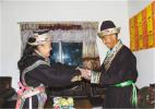 Dec. 2, 2016 -- Photo shows that Yangjain Zhoima, the eldest daughter of Dawa, is delivering food to his father at Bayiqu, Nyingchi. [Photo/China Tibet News]