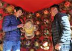 Dec. 7, 2016 -- Walking across the street, you can have a commanding view of all kinds of characteristic products such as hand knotted wool articles, Tibetan wooden bowl, Tibetan furniture, Tibetan incense, Tibetan medicine, Tibetan egg, yak meat and so on.