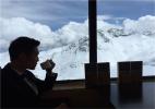 Dec. 12, 2016 -- A cafe sitting at 4,860 meters atop Dagu Glacier in Sichuan Province is known as the highest cafe in the world. The cafe, which opened in early 2016, offers tourists a brew with a spectacular view of the Dagu Glacier National Park. It is dubbed `the loneliest cafe in the world.` Dagu Glacier, situated in Heishui County of Aba Tibetan and Qiang Autonomous Prefecture, features modern mountain glaciers rarely seen in the world. [Photo/newssc.org]