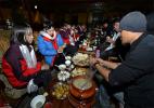 Dec. 16, 2016 -- Tourists enjoying delicious Tibetan traditional cooking.