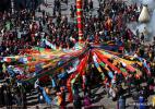 Feb. 8, 2017 -- People of Tibetan ethnic group perform acrobatics during the Shangjiu Festival in Qiaoqi Tibet Autonomous Township of Baoxing County in Ya`an City, southwest China`s Sichuan Province, Feb. 5, 2017. The Shangjiu Festival, a traditional festival of Tibetan people, is celebrated on the ninth day of the first lunar month to pray for a good harvest. (Xinhua/Jiang Hongjing)