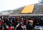 Feb. 10, 2017 -- A `sunning of the Buddha` ceremony is held at Labrang Monastery in the northwestern province of Gansu on Jan 9, 2017. (Photo/Xinhua)