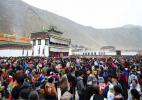 Feb. 13, 2017 -- People gather to watch the performance of religious dance to pray for a good year at Labrang Monastery in Xiahe county, Northwest China`s Gansu province, Feb 10, 2017. Labrang Monastery is one of six prestigious temples of the Gelug Sect of Tibetan Buddhism. [Photo/Xinhua]