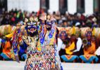 Feb. 13, 2017 -- Lamas wearing masks perform religious dance to pray for a good year at Labrang Monastery in Xiahe county, Northwest China`s Gansu province, Feb 10, 2017. Labrang Monastery is one of six prestigious temples of the Gelug Sect of Tibetan Buddhism. [Photo/Xinhua]