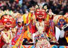Feb. 13, 2017 -- Lamas wearing masks perform religious dance to pray for a good year at Labrang Monastery in Xiahe county, Northwest China`s Gansu province, Feb 10, 2017. Labrang Monastery is one of six prestigious temples of the Gelug Sect of Tibetan Buddhism. [Photo/Xinhua]