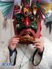 Feb. 15, 2017 -- A villager who is going to dance puts on a mask in Shimengou Village, Wenxiantielou Tibetan County, Longnan City, Gansu Province on February 10, 2017. (Photo / Caiyang)