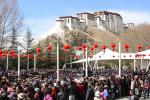 March 29,2017--People watch a performance to mark Serfs` Emancipation Day at Dzongyab Lukhang Park in Lhasa, Tibet autonomous region, on Tuesday. [Photo/China Daily]