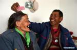 April 25, 2017 -- Nyima (L) and Dorji Chagxi, who fell in love when living at a nursing home for elders, smile at the nursing center in Shannan city, southwest China`s Tibet Autonomous Region, April 19, 2017. A total of 11,400 elders have been arranged in 81 rest homes in Tibet by 2016. (Xinhua/Chogo)