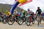 May 3,2017--Photo taken on May 1 shows male competitors setting out from the starting point. On May 1, the 5th Basum Tso Mountain Bike Race was held in the Basum Tso scenic spot, Gongbo`gyamda County, Nyingchi City, Tibet Autonomous Region. 117 competitors from home and abroad took part in the race. [Photo/Xinhua]
