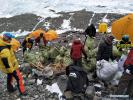 May 11,2017--People collect wastes at the north slope of the Mount Qomolangma in southwest China`s Tibet Autonomous Region, May 8, 2017. The nine-day cleaning campaign kicked off on May 6, targeting on campsites at altitudes between 5,200 and 6,500 meters. Wastes are mainly made up of oxygen cylinders, cans, bottles, plastics, discarded tents and climbing ropes left by mountaineers. (Xinhua/Awang Zhaxi) 