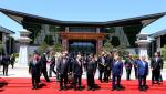 May 16, 2017 -- President Xi Jinping and guests prepare for a group photo after the first session of the Leaders Roundtable of the Belt and Road Forum (BRF) for International Cooperation at Beijing Huairou International Conference Center at Yanqi Lake on Monday. WU ZHIYI/CHINA DAILY