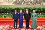 May 15, 2017 -- President Xi Jinping and his wife Peng Liyuan welcome Philippine President Rodrigo Duterte and his partner before a banquet for the Belt and Road Forum for International Cooperation in Beijing, May 14, 2017. (Photo/Xinhua)