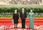 May 15, 2017 -- President Xi Jinping and his wife Peng Liyuan welcome Chilean President Michelle Bachelet before a banquet for the Belt and Road Forum for International Cooperation in Beijing, May 14, 2017. (Photo/Xinhua)