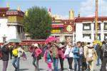 June 8, 2017 -- Photo shows tourists at the Jokhang Temple square. [Photo/China Tibet News]
