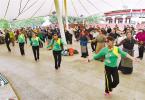 July 14,2017--Recently, citizens are dancing in the Dzongyab Lukhang Park of Lhasa City. [Photo/China Tibet News]
