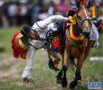 Aug.1,2017--A horseman is performing in the horse racing activity. [Photo/Xinhua]