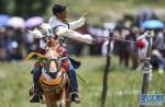 Aug.1,2017--A horseman is performing arrow shooting on the horse. [Photo/Xinhua]