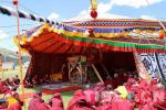 Aug.3,2017--The Panchen Lama recites dharma inside his tent.