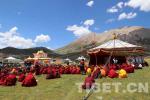 Aug.3,2017--Monks of Gongsar Monastery listen attentively to the dharma ceremony.