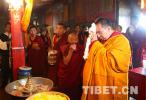 Aug.10,2017--Photo shows the Panchen Lama presents a khata to the stupa.