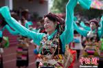 Aug.11,2017--Photo: Performances with ethnic characteristics at the opening ceremony of the festival. [Photo/China News Service]