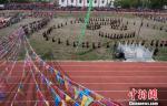 Aug.11,2017--Photo shows a lawn dance performance at the opening ceremony. [Photo/China News Service]