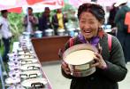 Aug. 22, 2017 -- Home made yogurt are presented in a yogurt contest in Nyangra Township of Chengguan District in Lhasa, capital of southwest China`s Tibet Autonomous Region, Aug. 19, 2017. (Xinhua/Chogo)