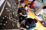 Aug. 29, 2017 -- Local women work in a tapestry cooperative founded by Tenzin Chenglai (right) in Gyangze county in Xigaze city, Tibet autonomous region. [Photo by Feng Yongbin/China Daily]