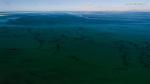 Oct. 21, 2017 -- Aerial photo taken on Oct. 19, 2017 shows Qinghai Lake, China`s largest inland saltwater lake, in northwest China`s Qinghai Province. The surface area of Qinghai Lake reached 4,497.01 square km, the highest record since 2001, according to data from the Qinghai Institute of Meteorological Sciences. Qinghai Lake plays an important role in the ecological security of the Qinghai-Tibet Plateau. It has been expanding since 2005 thanks to abundant precipitation in surrounding areas and increased snow melt due to climate change. (Xinhua/Wu Gang)  