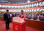 Oct. 24, 2017 -- A delegate casts ballot in the election of the new Central Committee and the new Central Commission for Discipline Inspection of the Communist Party of China (CPC) during the closing session of the 19th CPC National Congress at the Great Hall of the People in Beijing, capital of China, Oct. 24, 2017. (Xinhua/Pang Xinglei) 