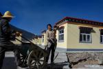 Nov.8,2017-- Builders work at the resettlement site of Daguo Village of Riwoqe County, southwest China`s Tibet Autonomous Region, Nov. 5, 2017. A total of 342 villagers from 60 impoverished households in Daguo Village are expected to move into their new houses by the end of this month. (Xinhua/Liu Hongming)