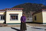 Nov.8,2017-- Dezong, a woman of Tibetan ethnic group, poses for photos at the resettlement site of Daguo Village of Riwoqe County, southwest China`s Tibet Autonomous Region, Nov. 5, 2017. A total of 342 villagers from 60 impoverished households in Daguo Village are expected to move into their new houses by the end of this month. (Xinhua/Liu Hongming)