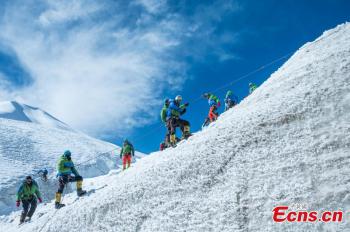 Climbers trained on snow mountain in Tibet