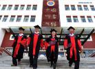 Nov. 13, 2017 -- Four PhD graduates are seen after a graduation ceremony at Tibet University in Lhasa, southwest China`s Tibet Autonomous Region, Nov. 10, 2017. Four PhD candidates researching Tibetan history, language or medicine became the first group of holders of doctorates awarded by a Tibetan university. (Xinhua/Chogo)