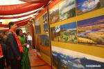 Nov. 13, 2017 -- Visitors view photos during the International Digital Art exhibition on Tibetan Cultural Heritage 2017 in Kathmandu, Nepal, Nov. 10, 2017. International Digital Art Exhibition on Tibetan Cultural Heritage began in Kathmandu, capital of Nepal, on Friday. (Xinhua/Sunil Sharma)
