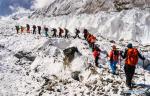 Nov. 14, 2017 -- Photo taken on Oct. 2, 2016 shows climbers on Mt. Qomolangma. A photo exhibition of Tashi Tsering, who topped the 8,844.43-meter-high mount for 12 times, opened at a museum in Lhasa, capital of southwest China`s Tibet Autonomous Region on Nov. 12, 2017. Mt. Qomolangma, located on the border of China and Nepal, is the world`s highest peak. (Xinhua/Tashi Tsering)