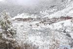 Nov. 16, 2017 -- Photo taken on Nov. 4, 2017 shows temples in Daocheng County of Tibetan Autonomous Prefecture of Garze, southwest China`s Sichuan Province. Yading is a national level reserve famous for its abundant natural resources. It is a mountain sanctuary and major Tibetan pilgrimage site comprising mountains, with the highest peak at 6,032 meters above sea level. (Xinhua/Jiang Hongjing)