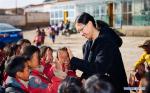 Nov. 24, 2017 -- Volunteer teacher Wu Tongyu plays with pupils at Bohai Primary School in Dagcanglhamo Township, Luqu County of Gannan Tibetan Autonomous Prefecture, northwest China`s Gansu Province, Nov. 17, 2017. Since 2015, 400 college students from universities within Gansu province have been dispatched to poor and ethnic regions as volunteer teachers in Gansu every year, which have contributed to the development of all-round education in these regions. (Xinhua/Liu Jinhai)