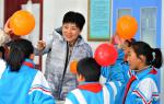 Dec. 1, 2017 -- Pupils take part in an experiment under the direction of teacher Xing Yue from north China`s Shaanxi at a primary school in Lhasa, capital of southwest China`s Tibet Autonomous Region, Nov. 29, 2017. Education quality of the region has seen great improvement since a program, in which excellent teachers from other places support the region through education, was launched in 2016. (Xinhua/Zhang Rufeng)