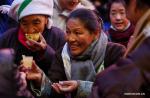 Dec.4,2017--People drink highland barley wine to celebrate the Fairy`s Day in Lhasa, capital of southwest China`s Tibet Autonomous Region, Dec. 3, 2017. The Fairy`s Day falls on the 15th day of the 10th month of the Tibetan calendar. On that day, Tibetans celebrate the day to commemorate Buddha Aleanterre Brahm. (Xinhua/Liu Dongjun)