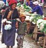 Dec. 12, 2017 -- Grandmother and child at the market 1995. [Photo by Bruce Connolly/chinadaily.com.cn]