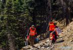 Dec.18,2017--Forest rangers patrol in Lunang Township in Nyingchi, southwest China`s Tibet Autonomous Region, Dec. 14, 2017. Nyingchi has expanded forest ranger team recently with the amount of full-time forest firefighters and part-time forest rangers reaching 412 and 45,000 respectively. (Xinhua/Liu Dongjun)